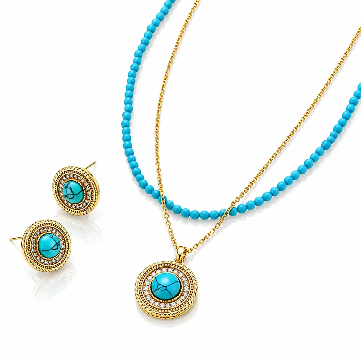 Gold jewelry set featuring a necklace and matching stud earrings with round turquoise-blue stones surrounded by small clear stones and a textured gold border.