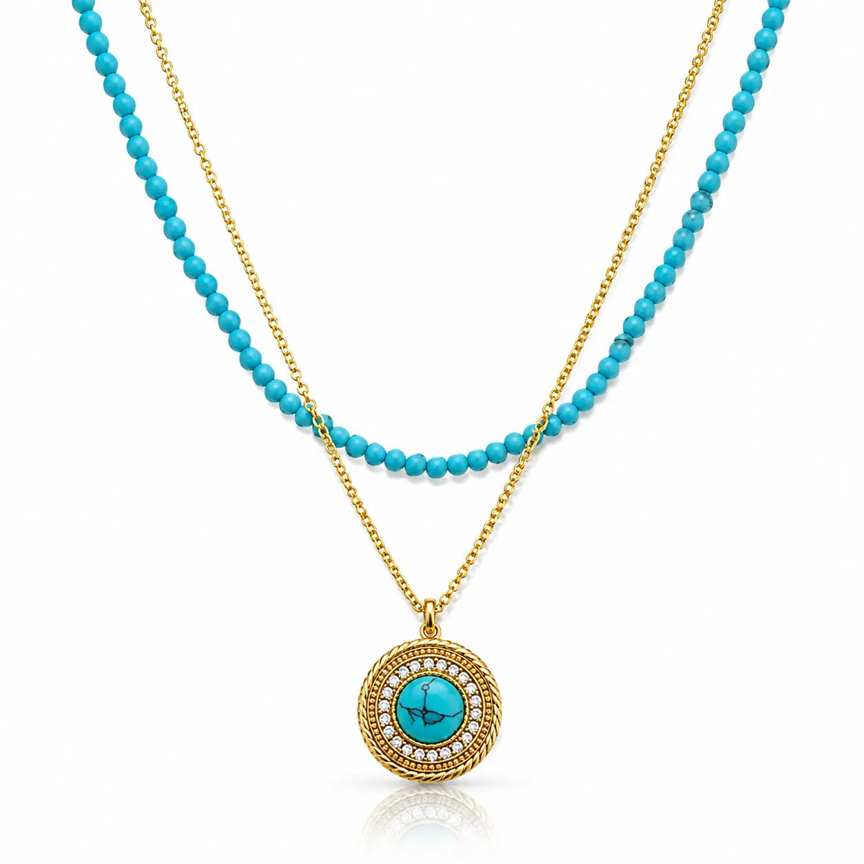 A double-strand necklace featuring a turquoise and gold layered design. One strand consists of small, round turquoise beads on a gold chain, while the other is a delicate gold chain.
