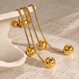 Twin Orb Tassel Earrings - 18K Gold PVD Plated