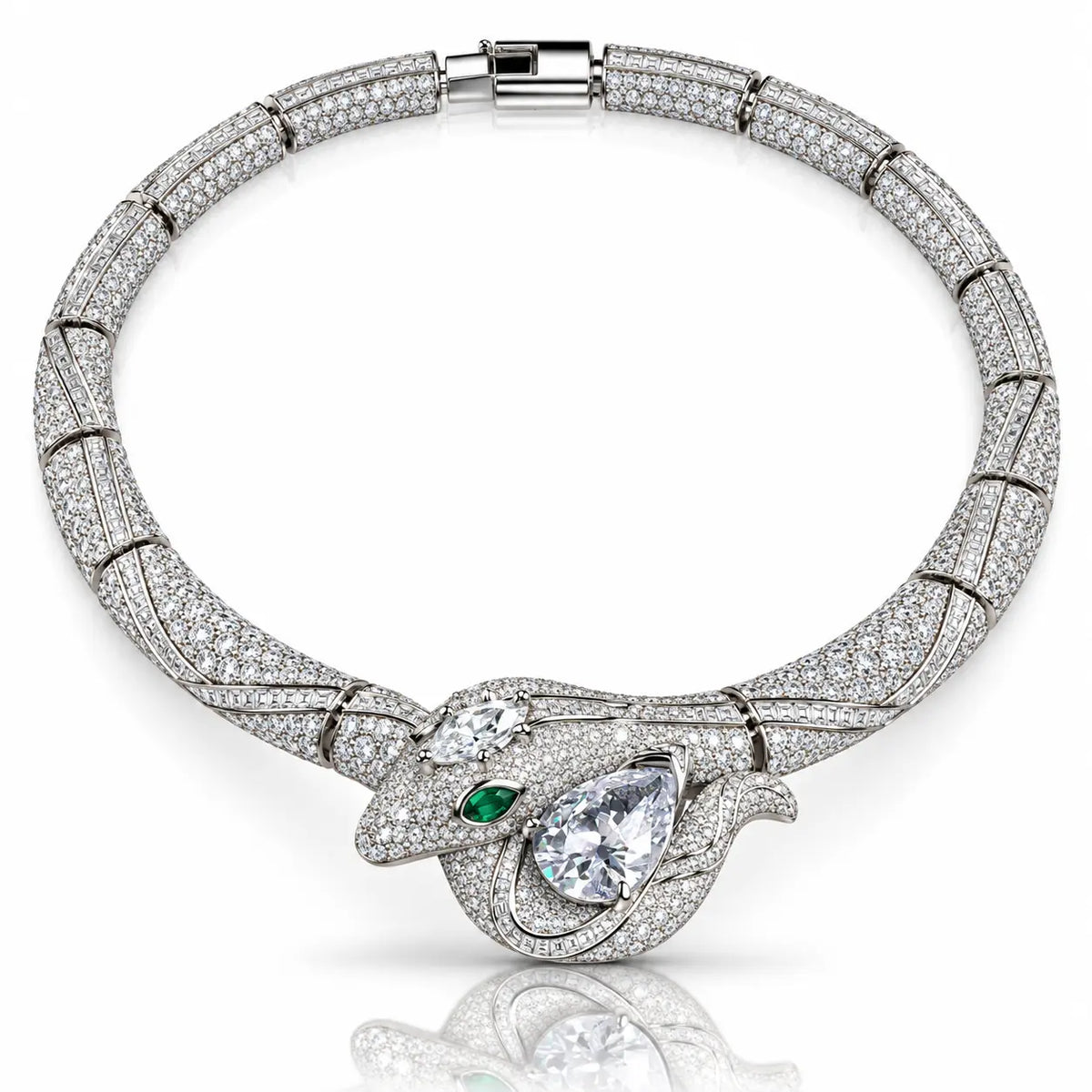 A luxury diamond and silver-toned metal bracelet featuring a snake-head motif with a green emerald accent and pear-cut center stone, displayed on a clean white background with a soft reflection.