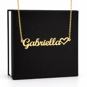 Gold necklace with 'Gabriella' and a heart on a black box