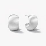 Brushed silver curve stud hoop earrings on white background, minimalist jewelry design