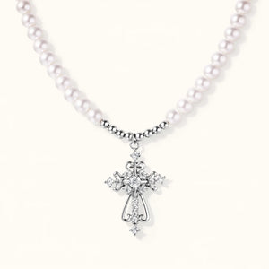 Pearl necklace with a diamond pendant on a white background