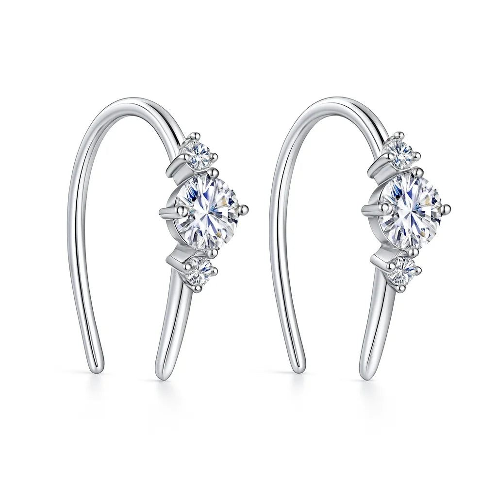 NovaFlare S925 sterling silver moissanite stud earrings, 0.36 ct each, white or gold finish with push-back closures.